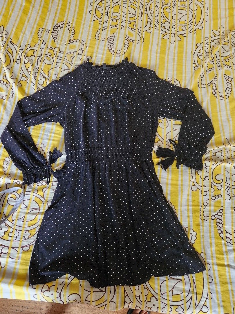 Topshop Polka Dot Dress (Category: Dresses) located in Boac. Submitted by maeleynes (Listing ID 1399398107, Image 3). Description: - Black dress with white polka dots - Long sleeves with ruffled cuffs and tie details - High neckline - Fitted waist - Flared skirt small - semi medium 2x lang nasuot 🙂 - Perfect for a casual, stylish look.