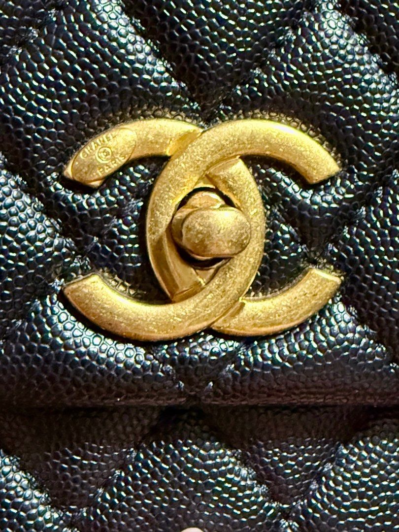 Vintage Chanel Coco Handle Bag from Japan (Category: Luxury Bags & Wallets) located in Cavite. Submitted by lady_speculator_ph (Listing ID 1400051607, Image 3). Description: Elegant Chanel Coco Handle bag. Features a black quilted leather exterior with a unique handle. Includes a gold-tone chain strap. The interior has a zip pocket and a leather tag with the Chanel logo. The bag has a classic CC turn-lock closure. ✅ Replaced detachable chain ✅ To