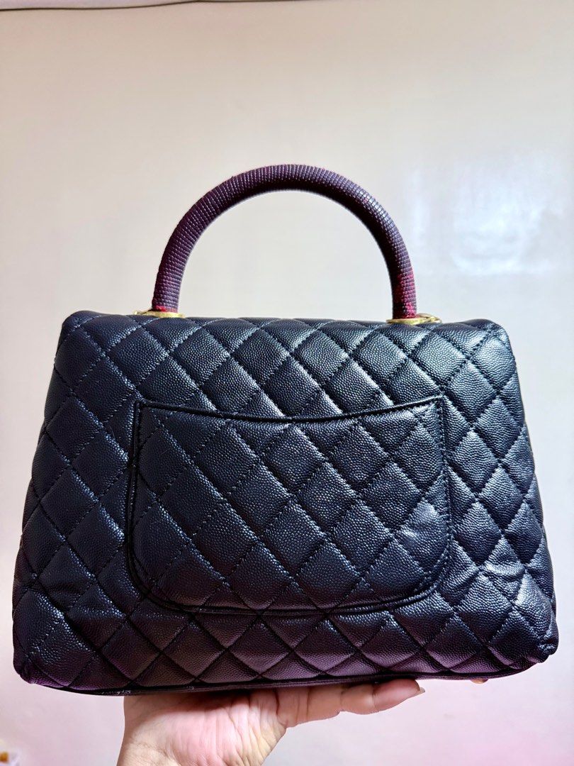 Vintage Chanel Coco Handle Bag from Japan (Category: Luxury Bags & Wallets) located in Cavite. Submitted by lady_speculator_ph (Listing ID 1400051607, Image 2). Description: Elegant Chanel Coco Handle bag. Features a black quilted leather exterior with a unique handle. Includes a gold-tone chain strap. The interior has a zip pocket and a leather tag with the Chanel logo. The bag has a classic CC turn-lock closure. ✅ Replaced detachable chain ✅ To