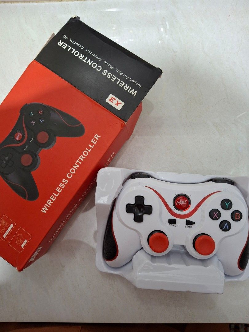 Wireless Controller X3 (Category: Controllers) located in Antipolo. Submitted by xanthimia16 (Listing ID 1400132759, Image 1). Description: - Slightly negotiable. - Delivery only. Payment via Gcash. - Wireless controller for phones, smart TVs, and PCs. - Stylish white design with red accents and black buttons. - Includes charging cable. - Comes in original packaging. - Standard button layout with directional pad and analog sticks. - Supports pads