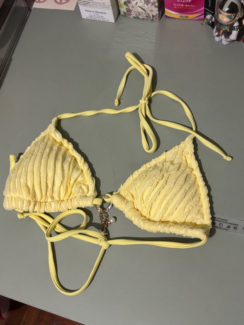 SHEIN Yellow Solid Color Summer Bikini (Category: Bikinis & Swimsuits) located in Manila. Submitted by skyfl4kesdeclutter (Listing ID 1400111040, Image 3). Description: - super cute and soft - super good bottom coverage - bought it off shein for a trip but never wore it since it wasn’t my size .