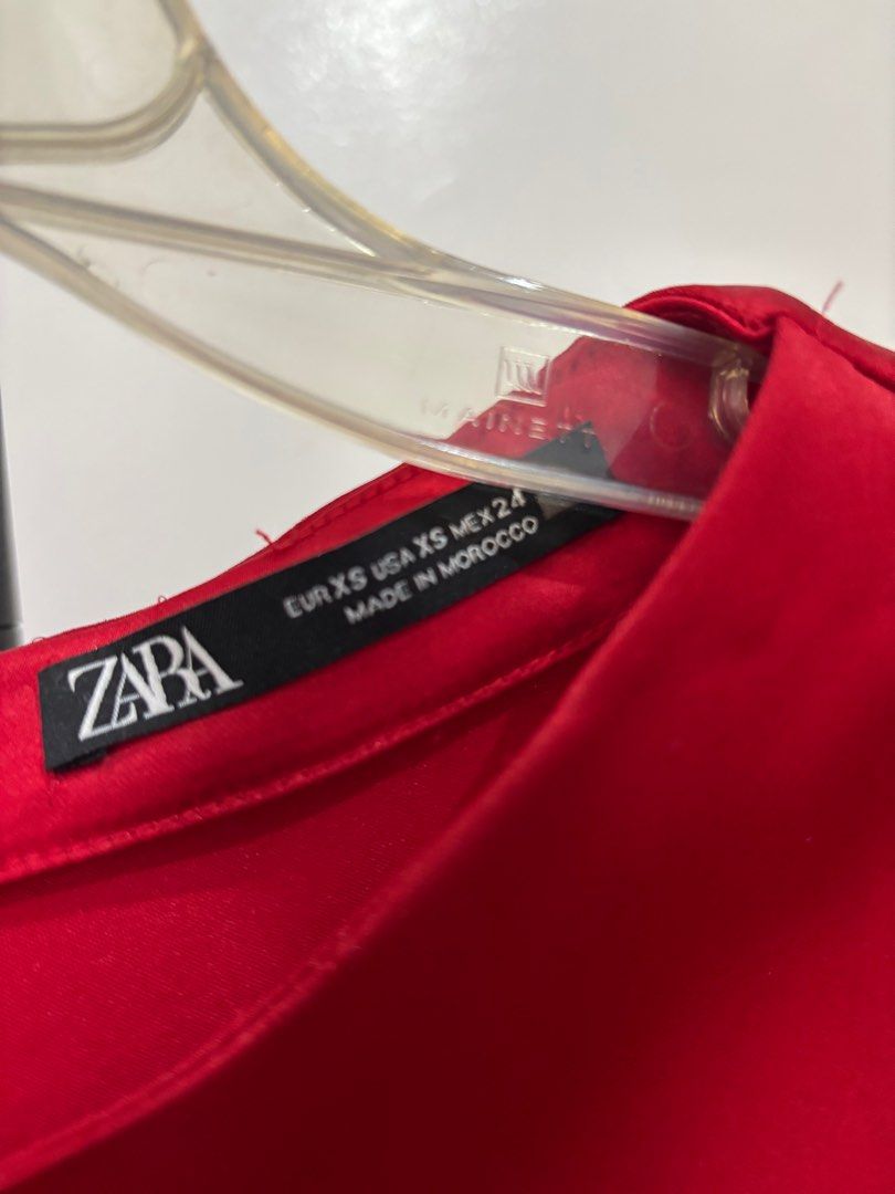 Zara Red Satin Midi Dress (Category: Dresses) located in Pasig City. Submitted by silverturtle_85d3b8 (Listing ID 1400024193, Image 2). Description: - Zara red midi dress - Draped neckline - Sleeveless - Satin finish - Midi length - Perfect condition.