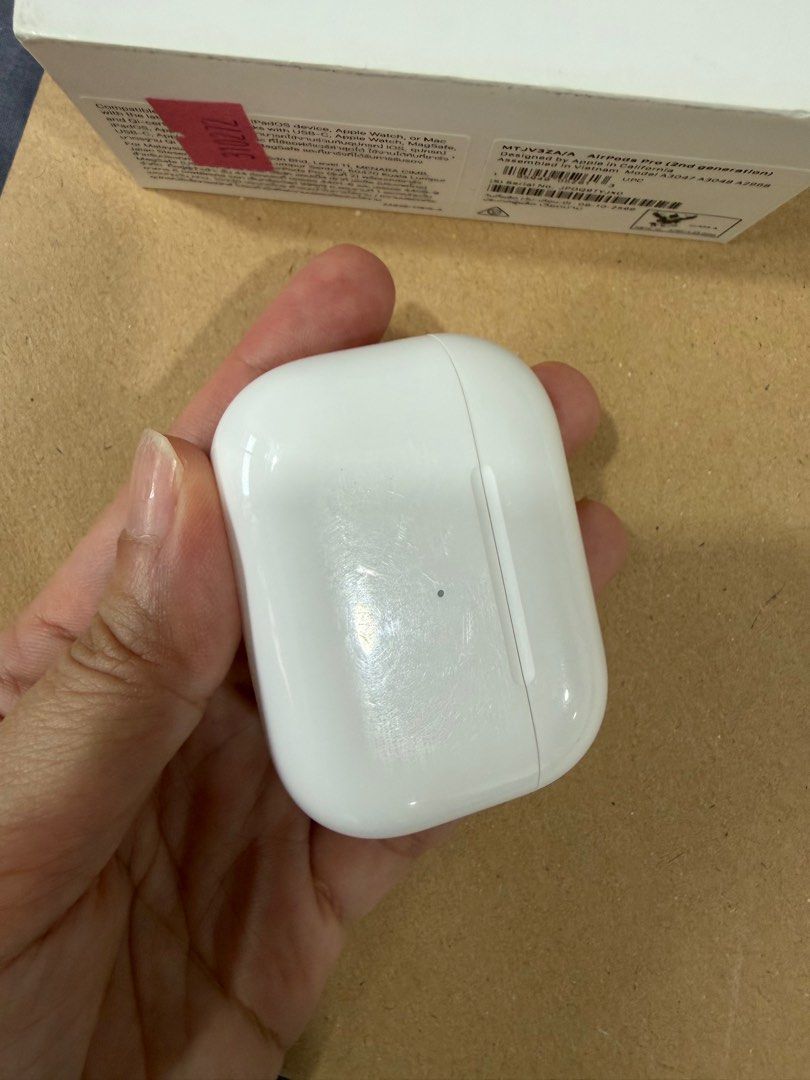 Airpods pro ( 2nd gen) with Magsafe case (USB-C) (Category: Earphones) located in Quezon City. Submitted by sbalane (Listing ID 1400274117, Image 3). Description: With light scratches fro the case With some linear cracks r/l earpods ( not even dropped) RFS: upgrade.