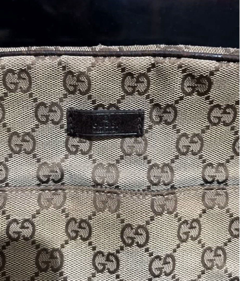 Authentic Vintage Gucci Bag (Category: Luxury Bags & Wallets) located in Marikina City. Submitted by impulsivebuyershop (Listing ID 1400364825, Image 3). Description: Authentic Vintage Gucci Bag With dustbag Bought at a thrift shop in Japan during my travel (year 2019) Actual size Length: approx. 22.5cm Width: approx. 19cm Gusset: Approximately 8.5cm This is a USED product, so due to use and storage, there may be scuffs, small scratches, a little