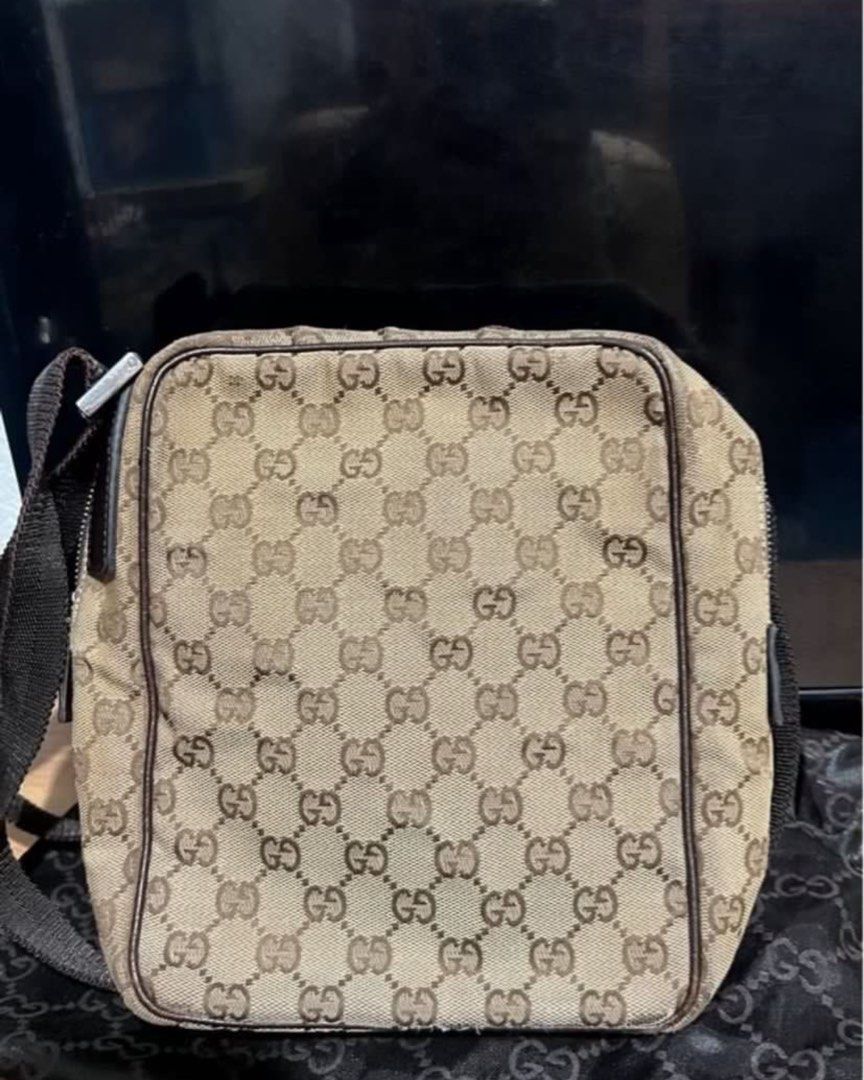 Authentic Vintage Gucci Bag (Category: Luxury Bags & Wallets) located in Marikina City. Submitted by impulsivebuyershop (Listing ID 1400364825, Image 2). Description: Authentic Vintage Gucci Bag With dustbag Bought at a thrift shop in Japan during my travel (year 2019) Actual size Length: approx. 22.5cm Width: approx. 19cm Gusset: Approximately 8.5cm This is a USED product, so due to use and storage, there may be scuffs, small scratches, a little