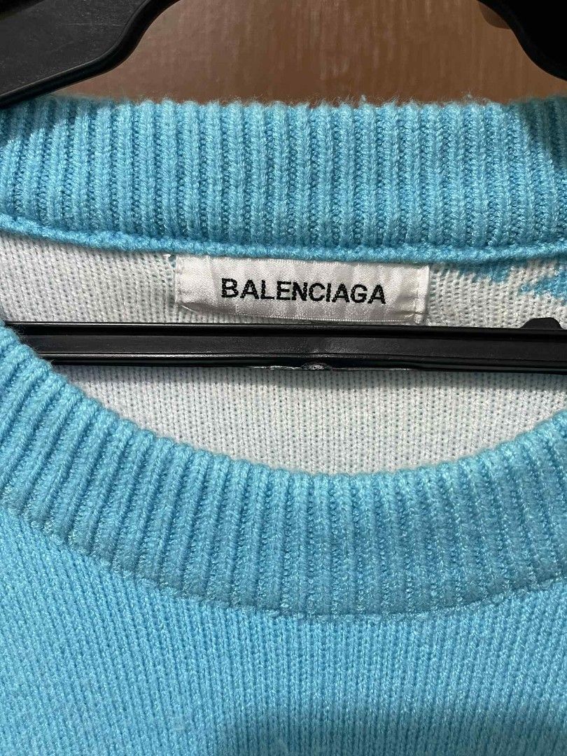 Balenciaga Logo Sweater XL (Category: Coats, Jackets and Outerwear) located in Manila. Submitted by SOLEJAAH (Listing ID 1400293987, Image 2). Description: 21x27 Dimensions fit to medium to large knitted sya used 1 time OFF.