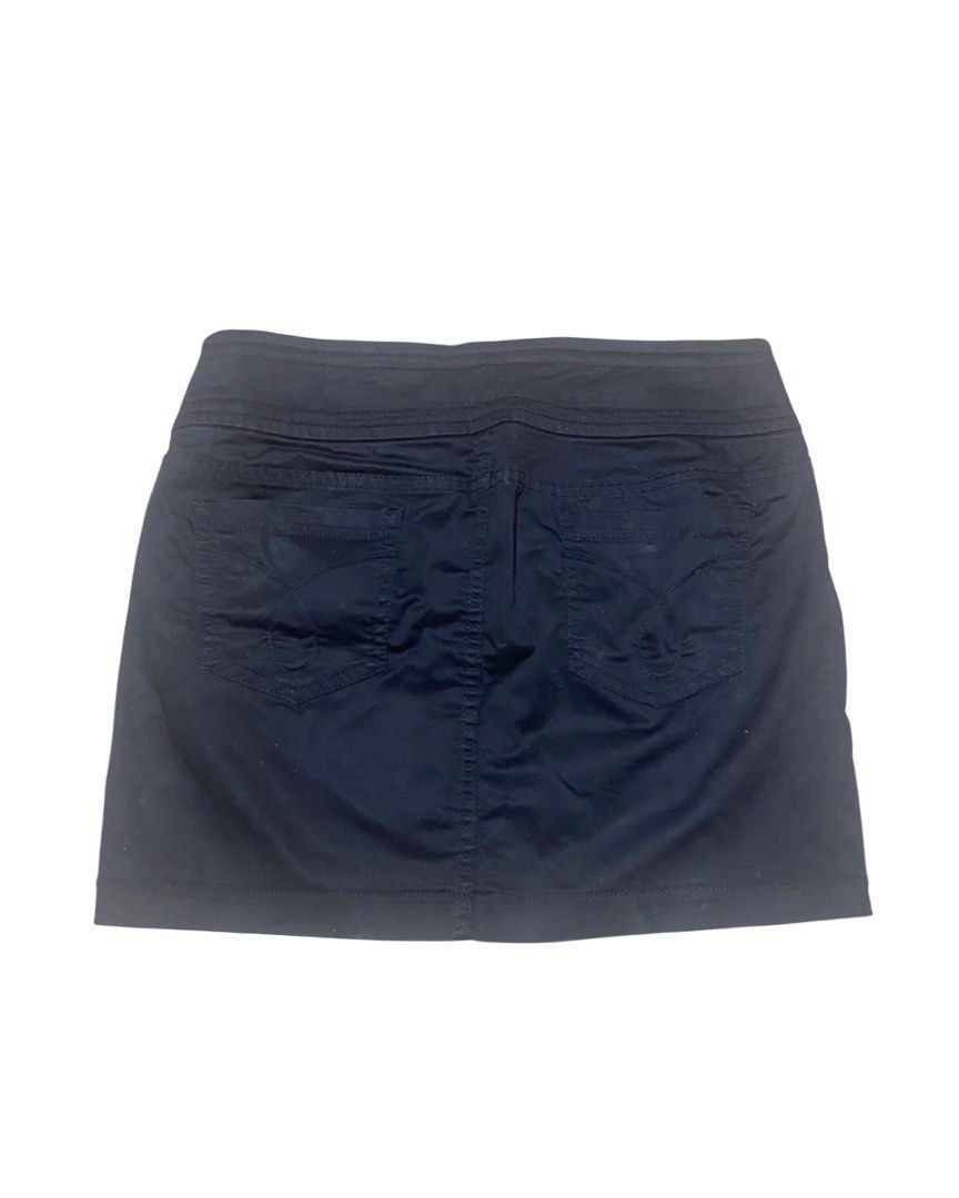 Calvin Klein Jeans Black Mini Skirt (Category: Skirts) located in Mandaluyong City. Submitted by declutts (Listing ID 1400208947, Image 2). Description: used once only W 28-30 L 14 No flaws Pm for ww Nego!.