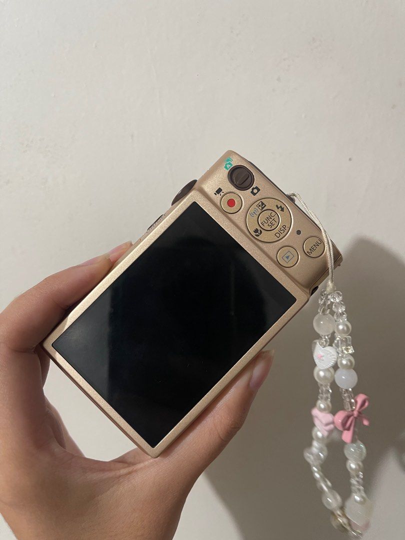 Canon Ixy 610F (Category: Cameras) located in Baguio. Submitted by kwynevanne (Listing ID 1400292305, Image 2). Description: - 12.1MP, 10x Optical Zoom - with built-in WiFi for easy sharing - Hybrid Auto with multiple scene modes: Portrait, Miniature, Toy Camera, Fireworks, Beach, and more - Creative filters + HD video - perfect for sunset shots, cafe, & travel dumps & beginner friendly! - cosmetics: 10/10 mint! - Slight issue: needs cleaning sa 