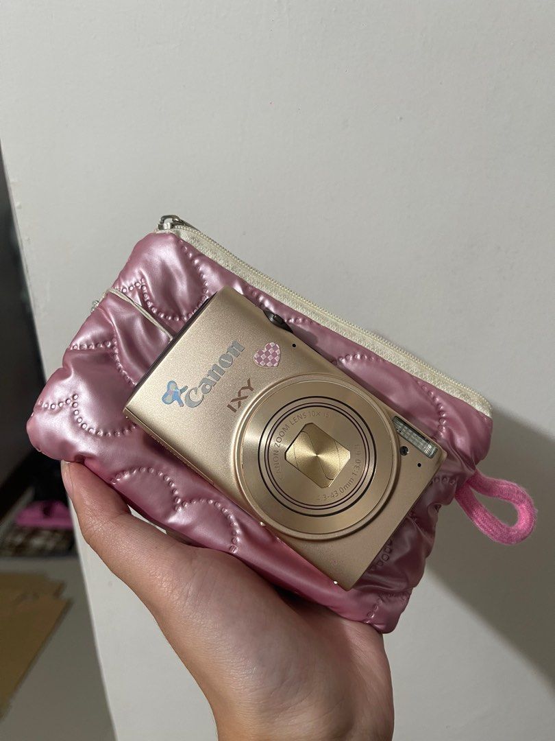 Canon Ixy 610F (Category: Cameras) located in Baguio. Submitted by kwynevanne (Listing ID 1400292305, Image 1). Description: - 12.1MP, 10x Optical Zoom - with built-in WiFi for easy sharing - Hybrid Auto with multiple scene modes: Portrait, Miniature, Toy Camera, Fireworks, Beach, and more - Creative filters + HD video - perfect for sunset shots, cafe, & travel dumps & beginner friendly! - cosmetics: 10/10 mint! - Slight issue: needs cleaning sa 