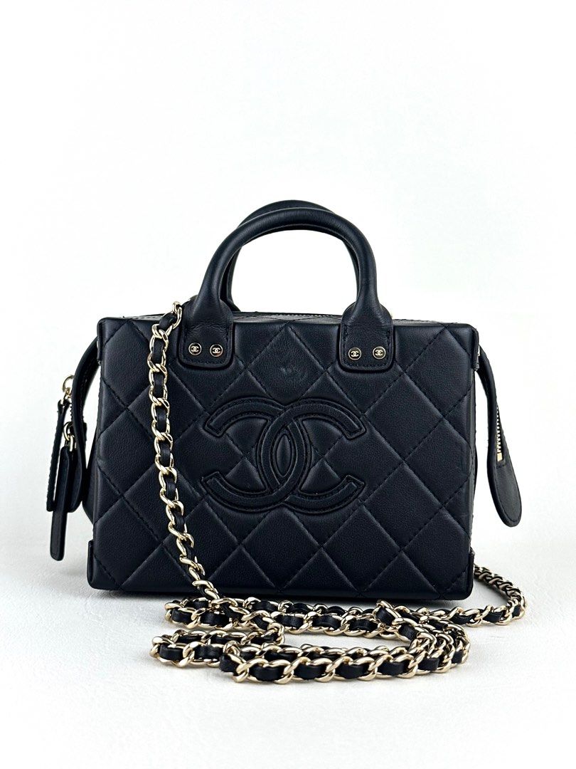 CHANEL Quilted Vanity Case (Category: Luxury Bags & Wallets) located in Manila. Submitted by luvluxe.mnl (Listing ID 1400253115, Image 1). Description: Mini size- can fit a lot of small stuffs like makeup, coins, iphone pro etc. in excellent condition Rare find!! So pretty & elegant Microchipped .
