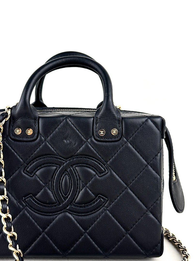 CHANEL Quilted Vanity Case (Category: Luxury Bags & Wallets) located in Manila. Submitted by luvluxe.mnl (Listing ID 1400253115, Image 2). Description: Mini size- can fit a lot of small stuffs like makeup, coins, iphone pro etc. in excellent condition Rare find!! So pretty & elegant Microchipped .