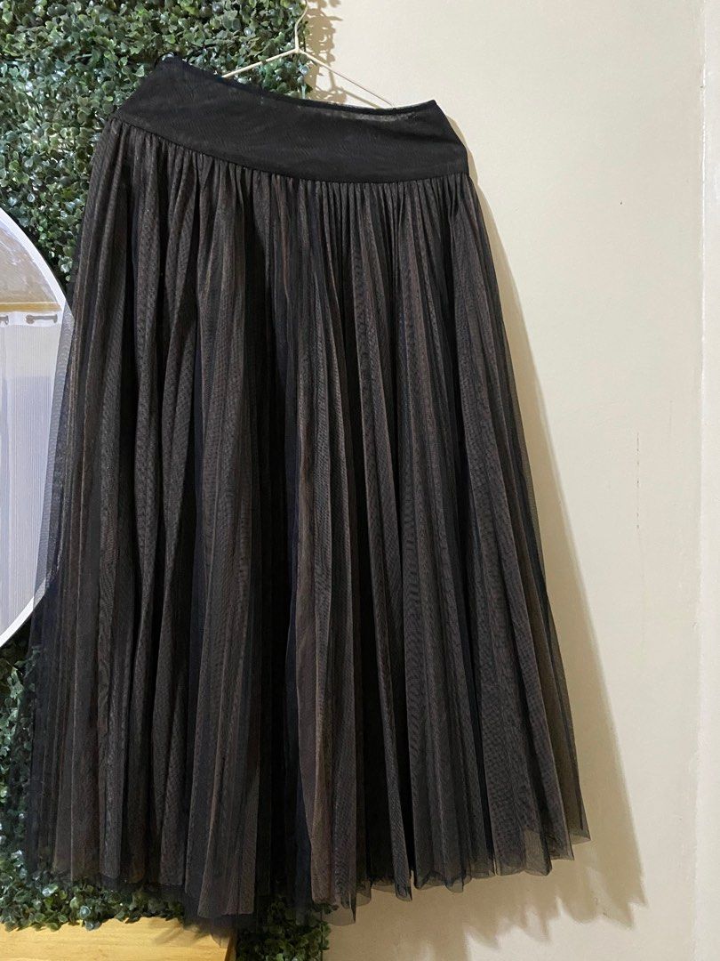 Christian Dior skirt (Category: Luxury Apparel) located in Manila. Submitted by avathriftedcloset (Listing ID 1400366141, Image 1). Description: 27-29 waist line 3 layer see through fabric.