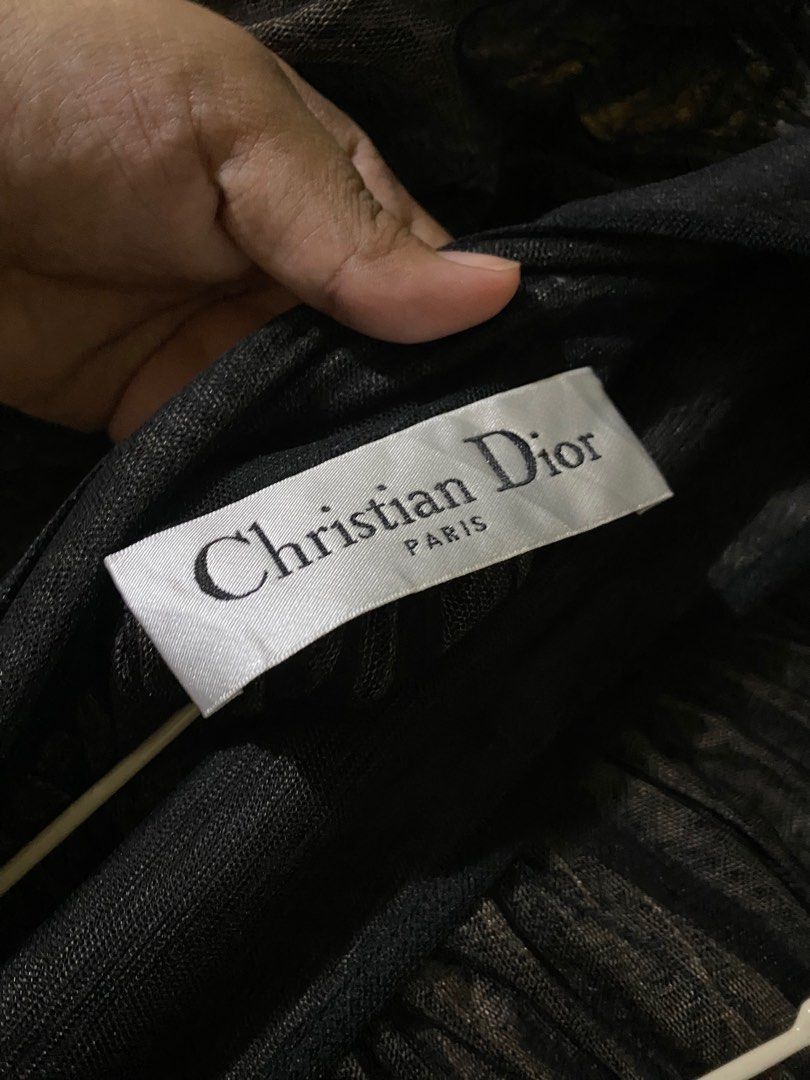 Christian Dior skirt (Category: Luxury Apparel) located in Manila. Submitted by avathriftedcloset (Listing ID 1400366141, Image 2). Description: 27-29 waist line 3 layer see through fabric.