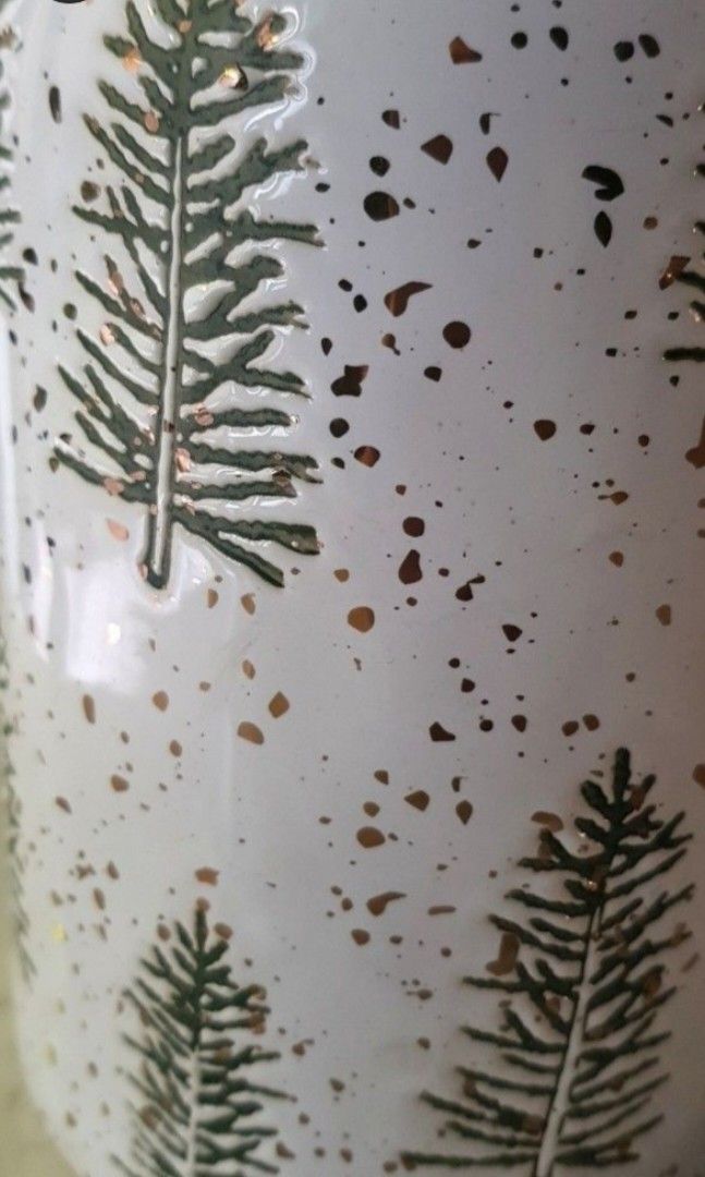 Classic Christmas Cookie Jar Pine trees by Potter's Studio (Category: Vases & Decorative Bowls) located in Quezon City. Submitted by happycheeeks (Listing ID 1400229169, Image 2). Description: just displayed good as new thick and heavy with rubber stopper 9 inches tall 5 inches diameter only for MM buyers last price.