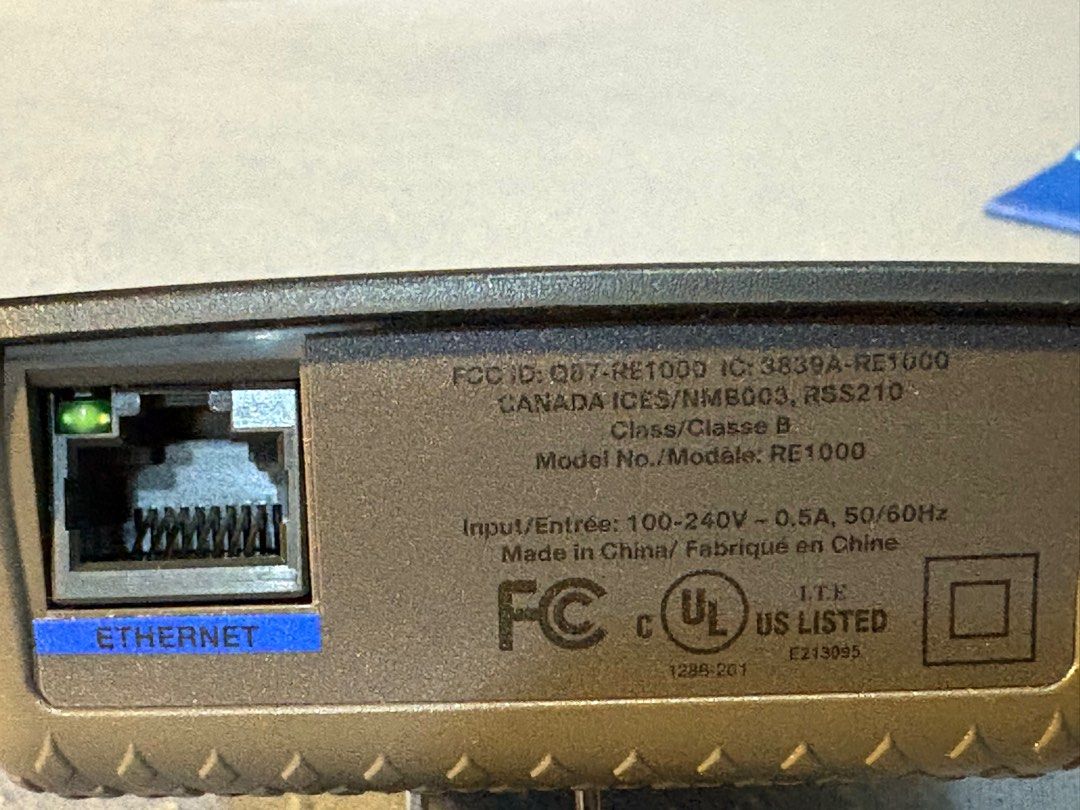 Cisco Linksys WiFi-n Extender RE1000 (Category: Networking) located in Taguig. Submitted by azusa_vad (Listing ID 1400327279, Image 2). Description: This RE1000 Wireless-n range extender increases your WiFi range, works as a bridge, has multiple internal antennas, 10/100 Mbps Ethernet, and is compatible with b/g/n Wi-Fi. You can use it to re-transmit the WiFi signal of your main router to a remote room or garage. Includes a built-in Fast Ethernet