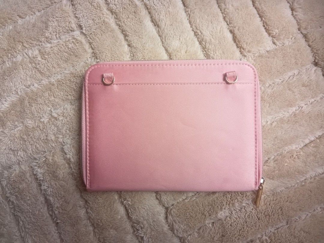FURLA Passport Holder (Category: Wallets & Card holders) located in Bulacan. Submitted by aarchive (Listing ID 1400245421, Image 2). Description: - Wear line along fold crease - Sling not included (lost) Last Price 15x20 cm MOP: BPI/Maya/Gcash Courier: J&T (Shipping fee shouldered by buyer).