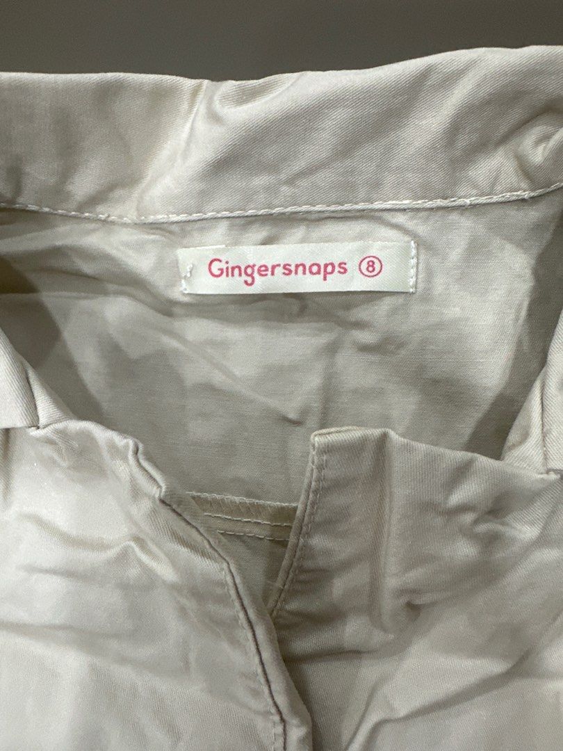 Gingersnaps Beige Dress Size 8 (Category: Babies & Kids Fashion) located in Quezon City. Submitted by sofia0228 (Listing ID 1400385603, Image 2). Description: - Gingersnaps beige dress - Size 8 - Collared neckline - Short sleeves - Pleated skirt - Button-up front - Lightweight fabric - Neutral color, versatile for different occasions.