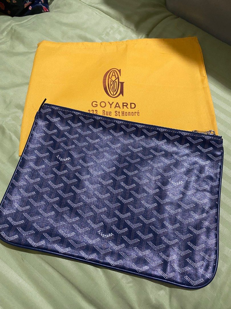 Goyard Navy Blue Clutch (Category: Luxury Bags & Wallets) located in Caloocan City. Submitted by switspice (Listing ID 1400357470, Image 1). Description: Goyard clutch pouch w/ dust bag 30cm x 22cm Flaw: displaced piping.