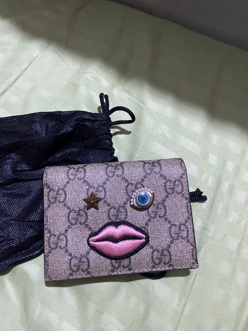 Gucci GG Supreme Wallet (Category: Luxury Bags & Wallets) located in Caloocan City. Submitted by switspice (Listing ID 1400354611, Image 1). Description: Gucci supreme small wallet Not coded Issue: eye accent faded.