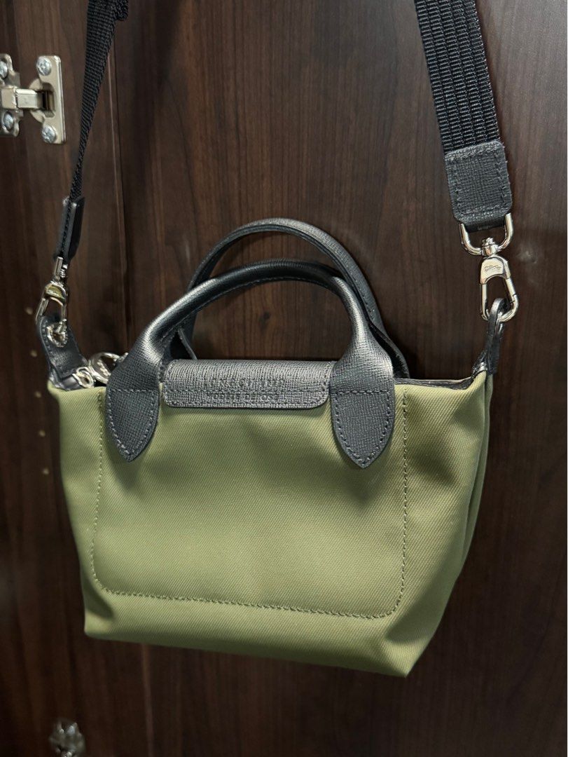 Longchamp Le Pliage Energy XS Handbag (Category: Luxury Bags & Wallets) located in Cebu City. Submitted by heyyyron (Listing ID 1400224014, Image 2). Description: •bought price : 17k (with receipt) •USED TWICE ONLY •NO STAINS my ig for assurance/reliability : @heyyyron.