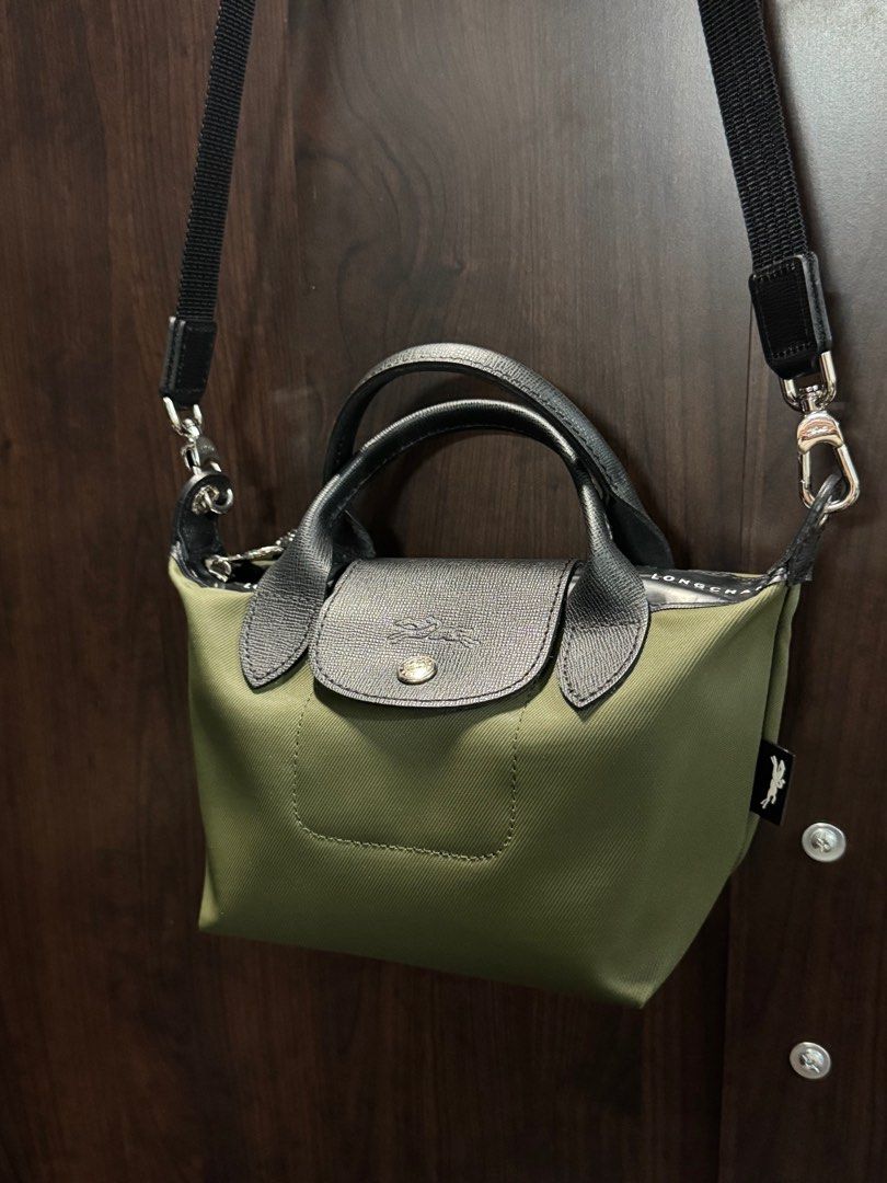 Longchamp Le Pliage Energy XS Handbag (Category: Luxury Bags & Wallets) located in Cebu City. Submitted by heyyyron (Listing ID 1400224014, Image 1). Description: •bought price : 17k (with receipt) •USED TWICE ONLY •NO STAINS my ig for assurance/reliability : @heyyyron.