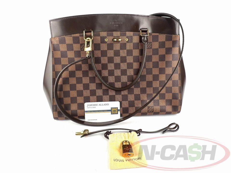 Louis Vuitton MM Damier Ebene Rivoli (Category: Luxury Bags & Wallets) located in Makati City. Submitted by luxury_by_ncash_2 (Listing ID 1400256777, Image 1). Description: N-Cash Pawnshop "Instant Cash for Bags, Watches, Cars, and Electronics" https://www.ncash-pawnshop-philippines.com/ Louis Vuitton MM Damier Ebene Rivoli PRE-OWNED Brand: Louis Vuitton Serial Number: CA2195 Color Brown Material Damier canvas, leather Hardware color Goldtone Ret