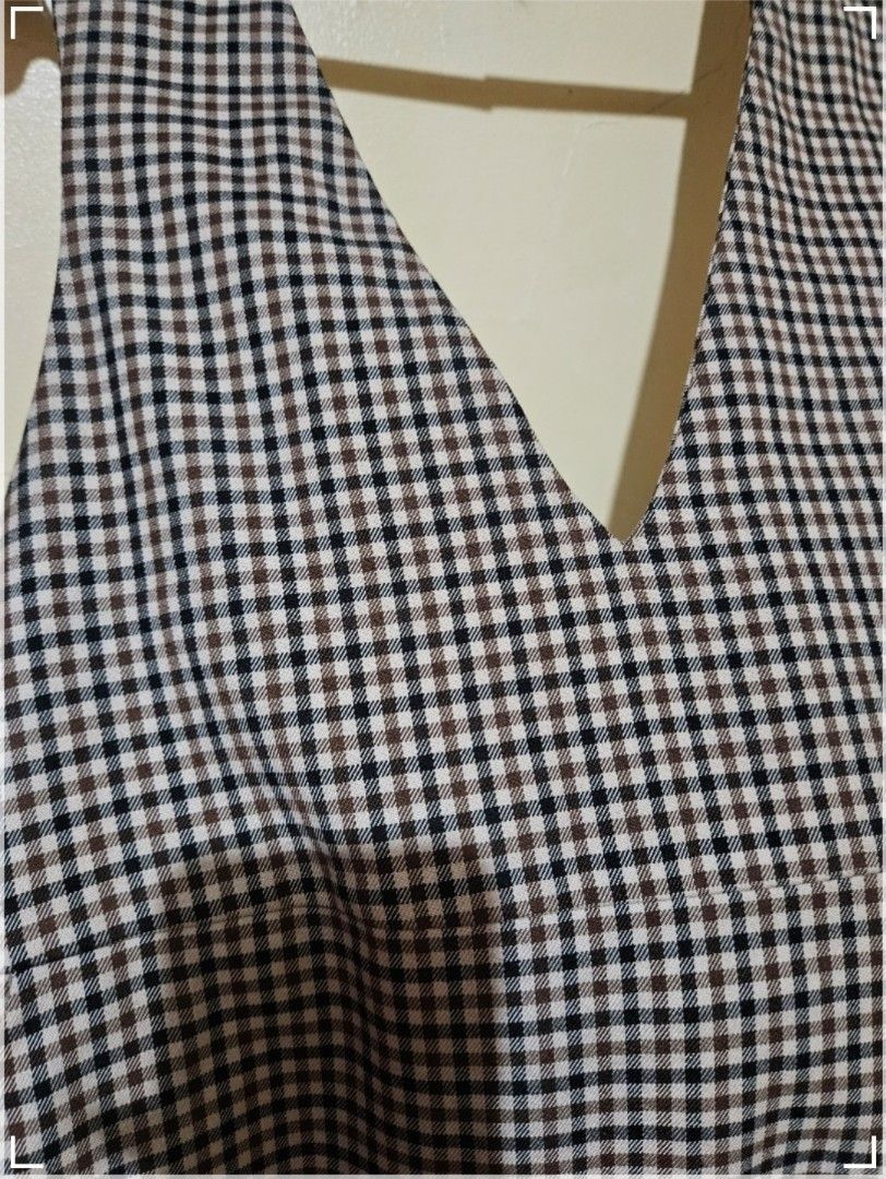 (M) Plaid V-Neck Dress (Category: Dresses) located in Pasay City. Submitted by reccaaaa (Listing ID 1400261506, Image 2). Description: Size: Medium Bust: up to 32 inches Width: 16 inches Overall Length: 42 inches Condition: 10/10 Other Details: • With working zipper on side • With 2 working side pockets • Good as new • Thick cotton fabric • Height reference (5'4) • Inner top not included RFS: Does not fit Location: Pasay No return, no exhange.