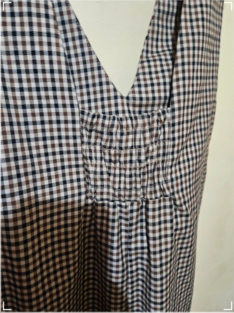 (M) Plaid V-Neck Dress (Category: Dresses) located in Pasay City. Submitted by reccaaaa (Listing ID 1400261506, Image 3). Description: Size: Medium Bust: up to 32 inches Width: 16 inches Overall Length: 42 inches Condition: 10/10 Other Details: • With working zipper on side • With 2 working side pockets • Good as new • Thick cotton fabric • Height reference (5'4) • Inner top not included RFS: Does not fit Location: Pasay No return, no exhange.