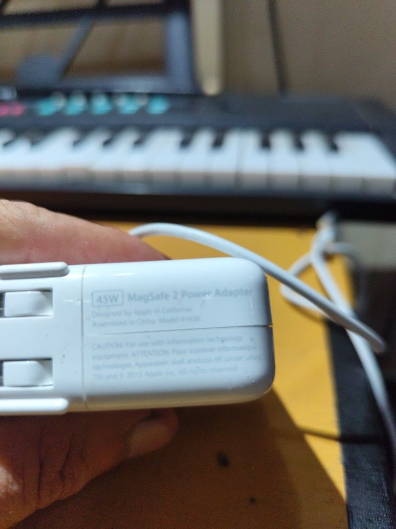 Macbook adaptor (Category: Laptops & Notebooks) located in Davao. Submitted by violentino74125 (Listing ID 1400380216, Image 3). Description: - Original Apple Macbook adaptor - Classic white design - Meetups available in Davao City.