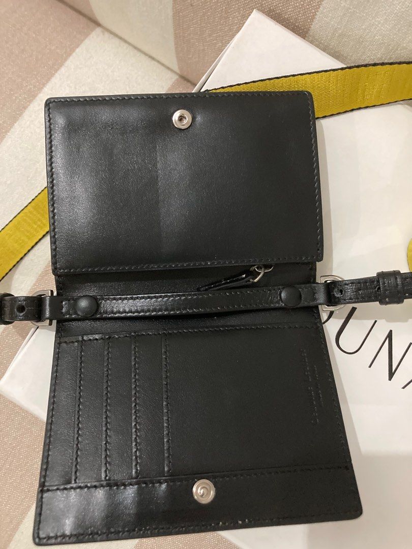 Off-White Diagonal Stripe Crossbody Bag (Category: Luxury Bags & Wallets) located in Angeles City. Submitted by silverpenguin.a36ad1 (Listing ID 1400368632, Image 3). Description: Nung nauso pa liitan ng bag naki uso ako halos wala ka malagay, just card and money. Cguro wallet with sling(balakajan) Basta sumisigaw off white Bought from Ounass(pwede nyo i google) 100% Authentic Ounass replacement box Used but no abuse .