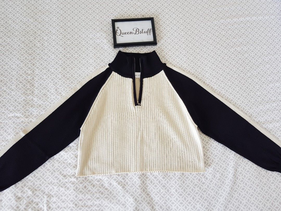 Ribbed Knit Sweater Set (Category: Sets or Coordinates) located in Pasig City. Submitted by queenbstuff (Listing ID 1400318991, Image 2). Description: - AKKARA STUDIO Set. - Cream and Black color design. - Sweater with zip-up neckline. - Matching high waist wide-leg pants. - Drawstring waist. - Ribbed knit material. READ before making an offer. 🔹️Location: Pasig City 🔹️Shipping within Metro Manila Only 🔹️Read item description. 🔹️NO When Worn.