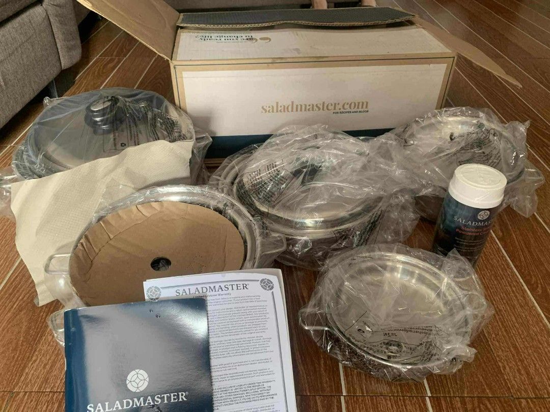 Saladmaster Stainless Steel Cookware Set (Category: Cookware & Accessories) located in Manila. Submitted by raygabriel42699 (Listing ID 1400330878, Image 1). Description: Set includes: 1 Qt. (.9L) Sauce Pan with Cover, 3 Qt. (2.8L) Sauce Pan with Cover, 3 Qt. (1.8L) Perforated Basket, 7 Qt. (6.6L) Roaster with Cover, 9 in. (22.9cm) Skillet with Cover, 11 in. (27.9cm) Skillet with Cover, Stainless Steel Powdered Cleaner, three long handles, four s