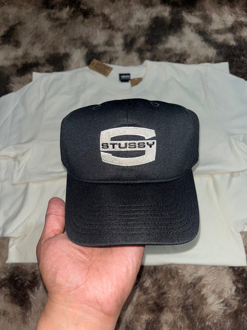 Stüssy T-shirts and Caps (Category: Tshirts & Polo Shirts ) located in Caloocan City. Submitted by kristoperlim (Listing ID 1400309802, Image 3). Description: Stüssy T-shirts and caps. The T-shirts are white with a green and black logo. ₱5500 Stussy Caps ₱5500.
