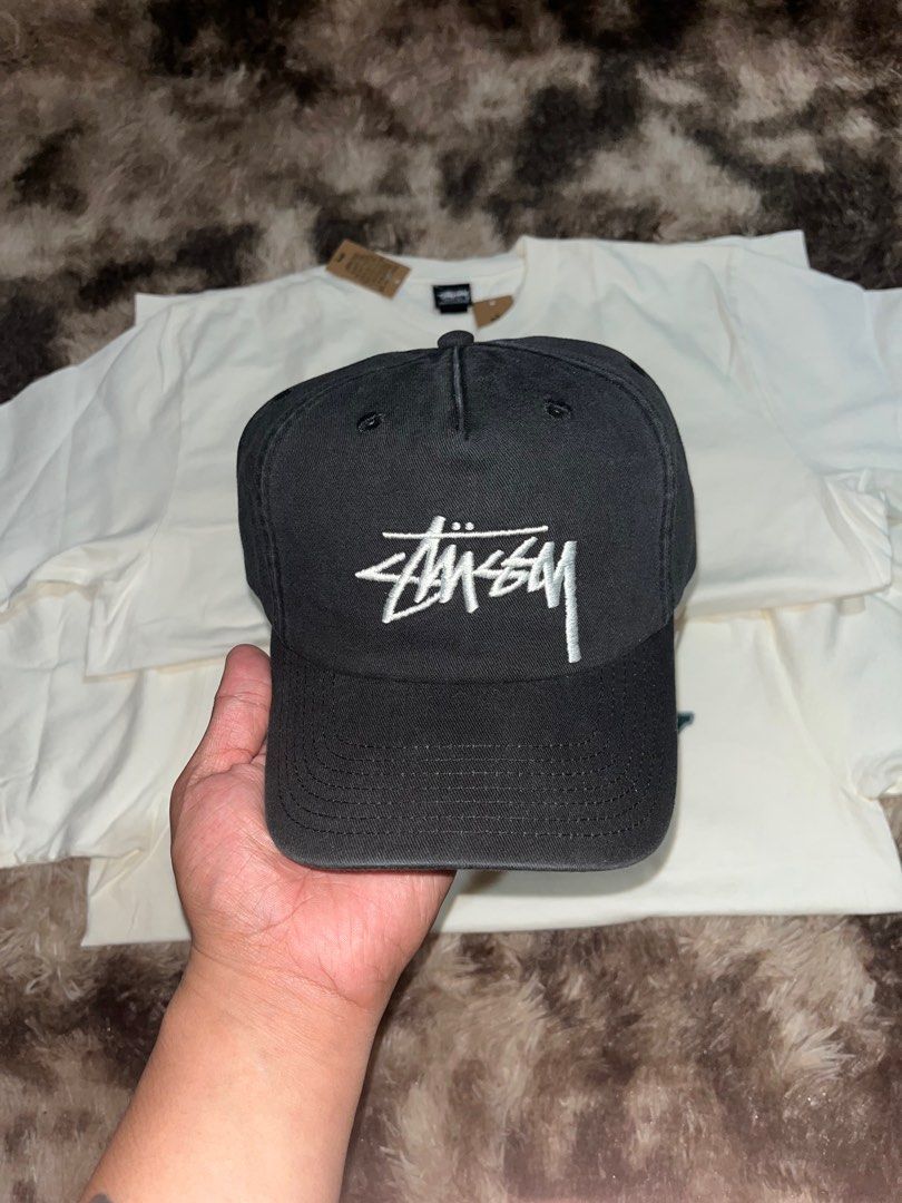 Stüssy T-shirts and Caps (Category: Tshirts & Polo Shirts ) located in Caloocan City. Submitted by kristoperlim (Listing ID 1400309802, Image 2). Description: Stüssy T-shirts and caps. The T-shirts are white with a green and black logo. ₱5500 Stussy Caps ₱5500.
