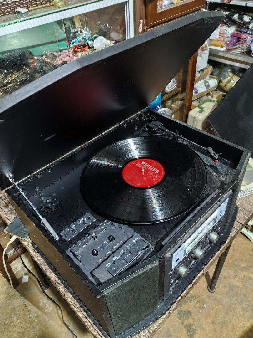 Turn Table - TEAC GF-450K7 (Category: Portable Music Players) located in Cebu City. Submitted by dudes_villanueva (Listing ID 1400318659, Image 3). Description: TEAC Turn Table GF-450K7 📌Is a multi-purpose music system that includes a turntable, cassette player, CD recorder, and AM/FM radio. 📌Functionality: It is an all-in-one unit that allows you to play vinyl records, cassette tapes, and CDs. It also has a built-in AM/FM stereo tuner. 📌Recor