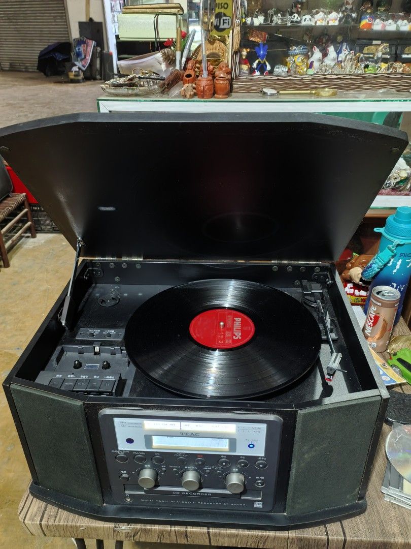 Turn Table - TEAC GF-450K7 (Category: Portable Music Players) located in Cebu City. Submitted by dudes_villanueva (Listing ID 1400318659, Image 1). Description: TEAC Turn Table GF-450K7 📌Is a multi-purpose music system that includes a turntable, cassette player, CD recorder, and AM/FM radio. 📌Functionality: It is an all-in-one unit that allows you to play vinyl records, cassette tapes, and CDs. It also has a built-in AM/FM stereo tuner. 📌Recor