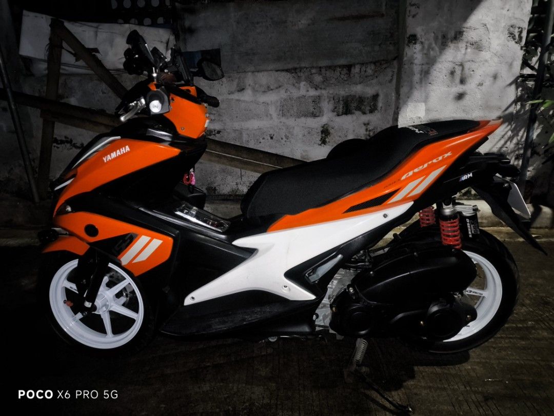 Yamaha Aerox Motorcycle (Category: Motorbikes for Sale) located in San Juan City. Submitted by jcbrea12345 (Listing ID 1400291572, Image 2). Description: Pwde sa maselan GAS N GO COMPLETE PAPERS REGISTERED WITH PLATE NUMBER NAKUHA KO SA FIRST OWNER PERO NAKA CLOSED DEED OF SALE SAKIN ORIG PAPERS Not tampered odo ALMOST 24K ODO Aerox V1 2019 Model -2 key plus manual - Motowolf CP holder -dual contact signal light -Parklight white -Gas tank 7liters