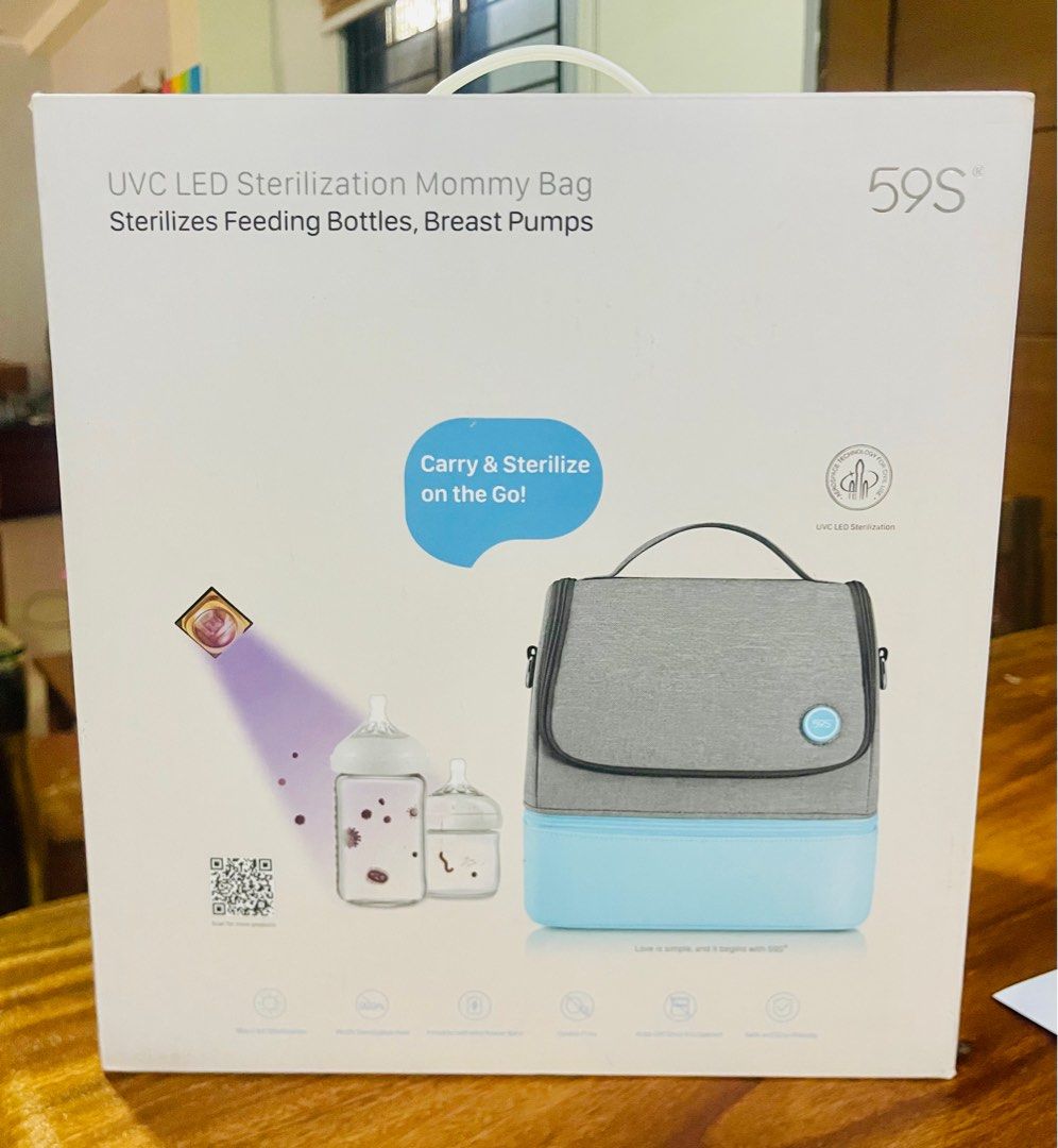 59S UVC LED P14 Blue Easy Carry Sterilizing Thermal Bag (Category: Breastfeeding & Bottle Feeding) located in Tarlac. Submitted by ynz_preloved (Listing ID 1400400646, Image 1). Description: Selling it low! Sealed brand new.