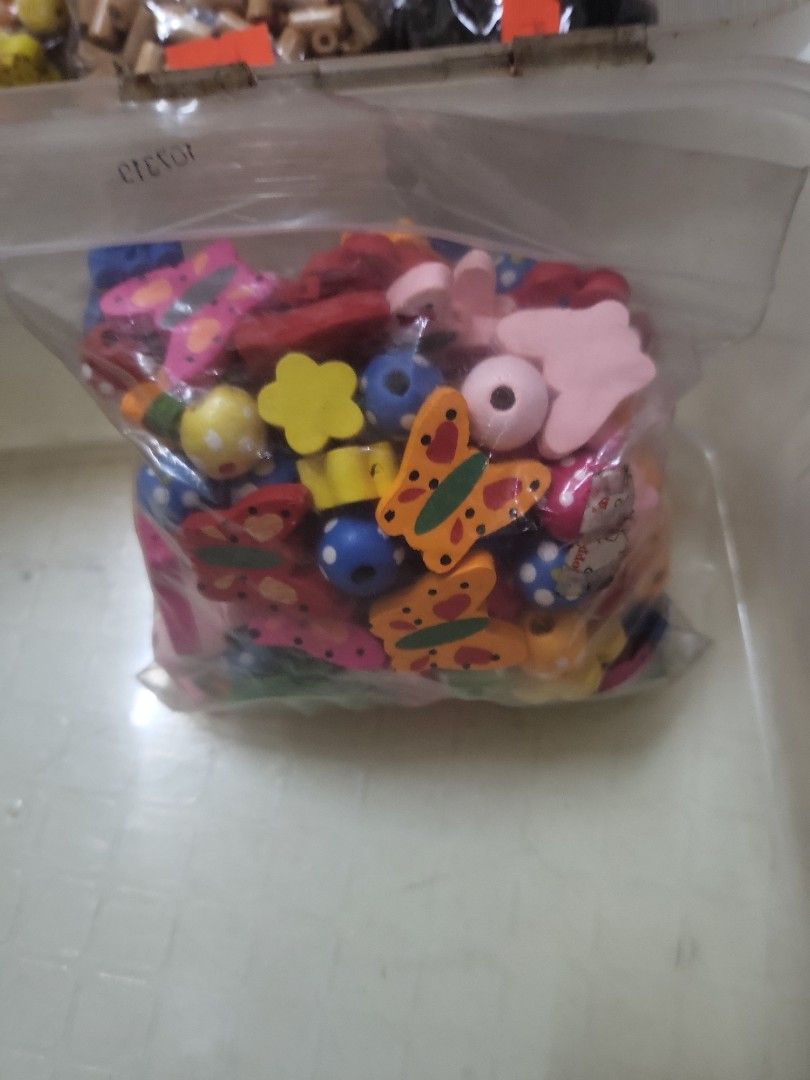Assorted Wooden Beads - Butterflies, Flowers (Category: Craft Supplies & Tools) located in Caloocan City. Submitted by lynette1977 (Listing ID 1400483264, Image 1). Description: assorted.