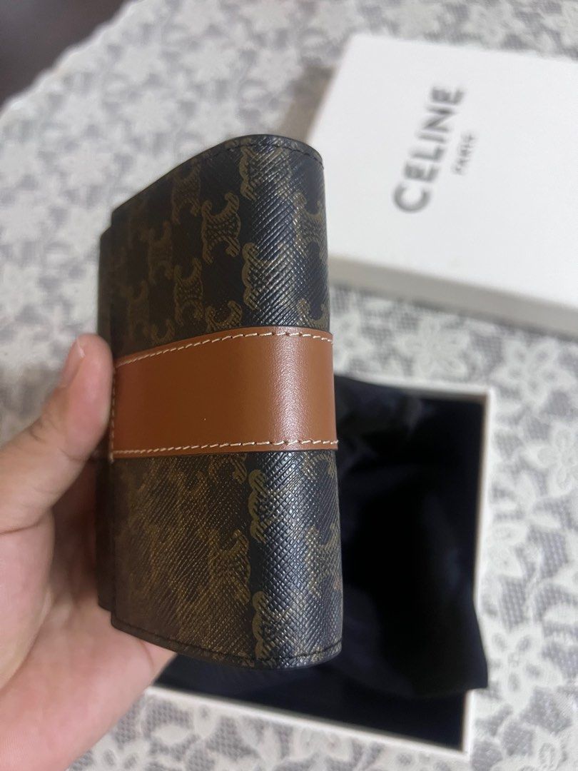Celine Triomphe trifold wallet (Category: Luxury Bags & Wallets) located in Paranaque City. Submitted by kgmgiftedph20 (Listing ID 1400458159, Image 3). Description: With box, dustbag.