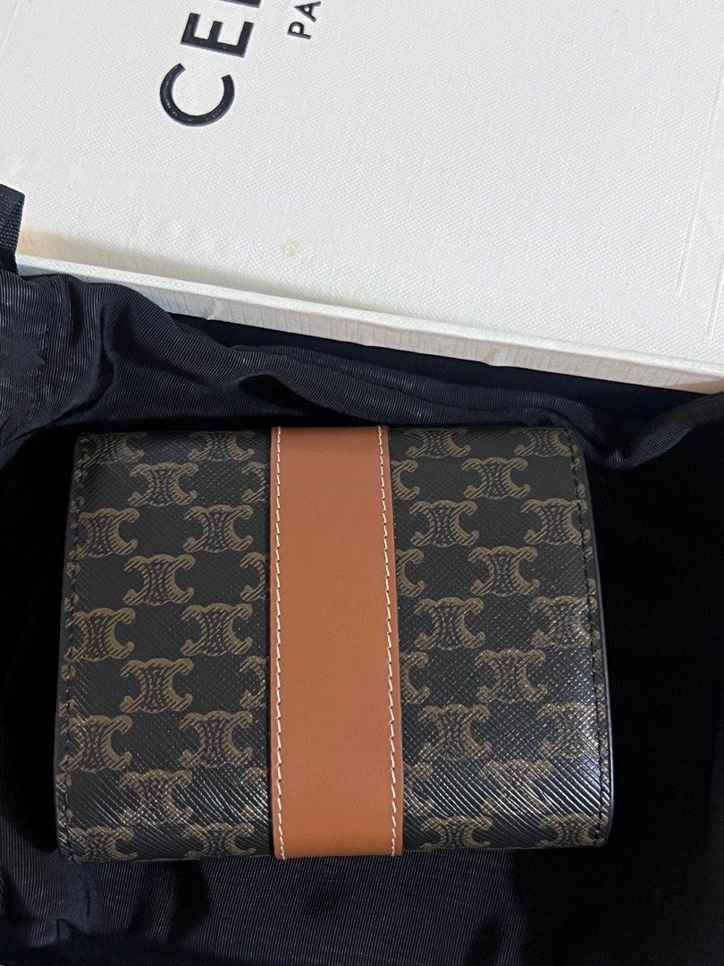 Celine Triomphe trifold wallet (Category: Luxury Bags & Wallets) located in Paranaque City. Submitted by kgmgiftedph20 (Listing ID 1400458159, Image 2). Description: With box, dustbag.