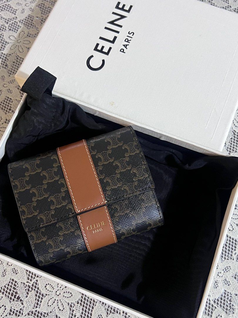 Celine Triomphe trifold wallet (Category: Luxury Bags & Wallets) located in Paranaque City. Submitted by kgmgiftedph20 (Listing ID 1400458159, Image 1). Description: With box, dustbag.