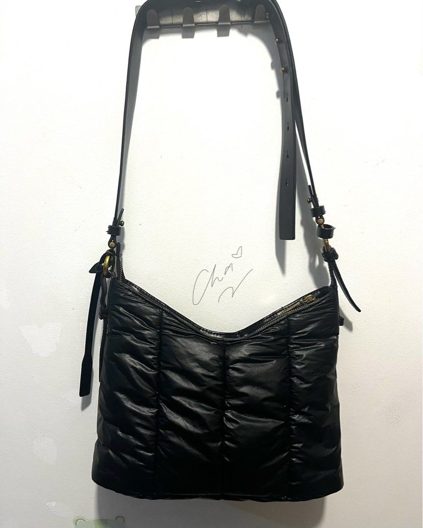 Charles & Keith Padded Shoulder Bag (Category: Shoulder Bags) located in Cainta. Submitted by chaching_corner (Listing ID 1400548093, Image 1). Description: ORIGINAL Charles & Keith Black Duo Quilted Shoulder Bag * good condition * 1 main compartment and 1 zipper closure compartment * Zipper closure * issue: strap lock sa magkabilang gilid ay natanggal na pero nakakabit pa rin siya sa hardware and useable pa as shoulder bag * rfs: not using anymo