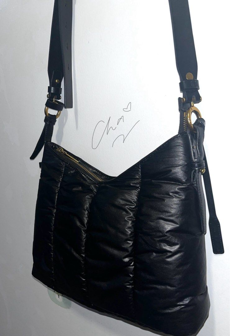 Charles & Keith Padded Shoulder Bag (Category: Shoulder Bags) located in Cainta. Submitted by chaching_corner (Listing ID 1400548093, Image 3). Description: ORIGINAL Charles & Keith Black Duo Quilted Shoulder Bag * good condition * 1 main compartment and 1 zipper closure compartment * Zipper closure * issue: strap lock sa magkabilang gilid ay natanggal na pero nakakabit pa rin siya sa hardware and useable pa as shoulder bag * rfs: not using anymo