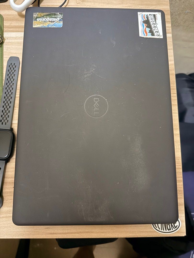 Dell Laptop (Category: Laptops & Notebooks) located in Mandaluyong City. Submitted by haydayyy (Listing ID 1400551367, Image 2). Description: - Dell laptop - Black keyboard and touchpad - Numeric keypad - Dell logo and stickers on the back - Issue with one keyboard specifically letter “E” and arrow down.