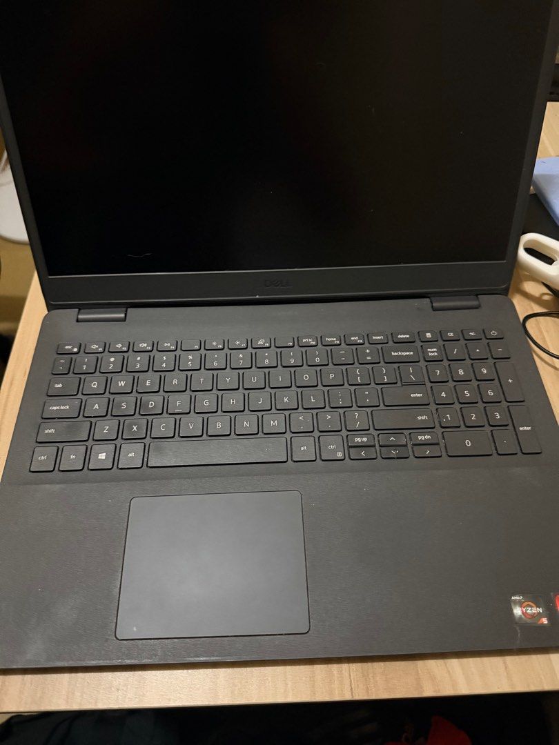 Dell Laptop (Category: Laptops & Notebooks) located in Mandaluyong City. Submitted by haydayyy (Listing ID 1400551367, Image 1). Description: - Dell laptop - Black keyboard and touchpad - Numeric keypad - Dell logo and stickers on the back - Issue with one keyboard specifically letter “E” and arrow down.