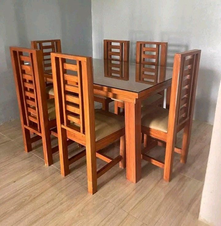DINING TABLE WITH TOP GLASS (Category: Tables & Sets) located in Mabalacat. Submitted by arlenemamangun01 (Listing ID 1400397643, Image 1). Description: High-quality Dining table set at an affordable price👌 Materials used: 📌Gemelina & mahogany wood 📌Uratex foam 📌German leather & fabric 📌Duco paint finished MADE TO ORDER⚒️ NO DP NEEDED✅ FREE TOP GLASS😍 COD & FREE DELIVERY 4 seater (3ft by 4ft) 6 seater (3ft by 5ft) 8 seater (3ft by 6ft) 10 s