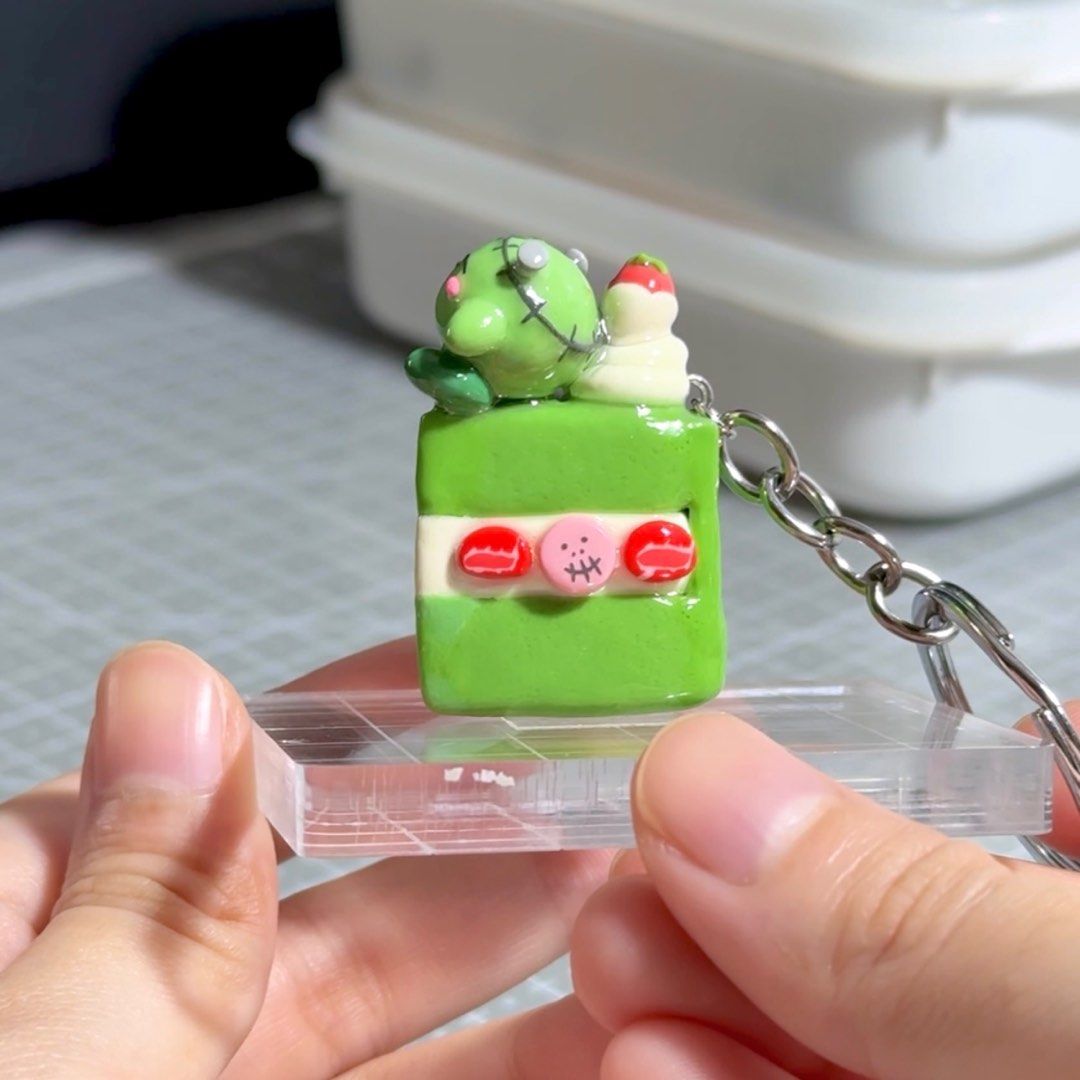Frankenstein Kirby | Handmade Polymer Clay Keychain (Category: Designer & Blind Box Toys) located in Las Pinas. Submitted by flwlab (Listing ID 1400561042, Image 2). Description: Frankenstein Kirby Halloween Themed Cake ✩ - 1 stock left - Made with polymer clay - Coated with UV resin - Kirby cake approx 4.3 cm height ** Since all figurines are 100% handmade, there may be small imperfections or slight variations in size and detail, but I do my bes