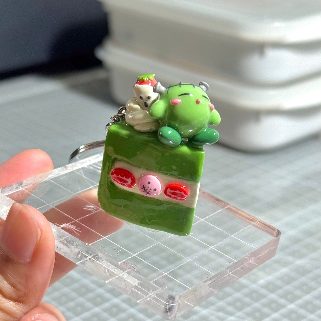 Frankenstein Kirby | Handmade Polymer Clay Keychain (Category: Designer & Blind Box Toys) located in Las Pinas. Submitted by flwlab (Listing ID 1400561042, Image 1). Description: Frankenstein Kirby Halloween Themed Cake ✩ - 1 stock left - Made with polymer clay - Coated with UV resin - Kirby cake approx 4.3 cm height ** Since all figurines are 100% handmade, there may be small imperfections or slight variations in size and detail, but I do my bes