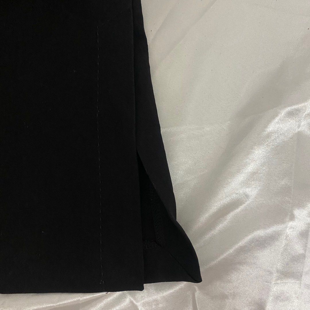 High Rise Wide Leg Flare Trouser (Category: Other Bottoms) located in Malabon City. Submitted by k_mby (Listing ID 1400541194, Image 3). Description: • waist 26-28 • length 40 • solid black • with slit both sides • 2 front pockets (no back pockets) • no issue.